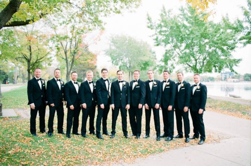 Groomsmen in black suits