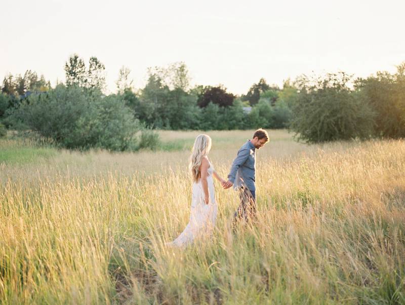 Sweet country engagement photos in sun-kissed fields