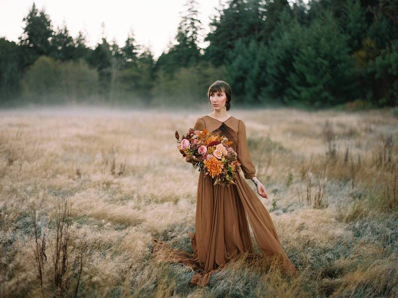 Sunrise bridal shoot in a misty field