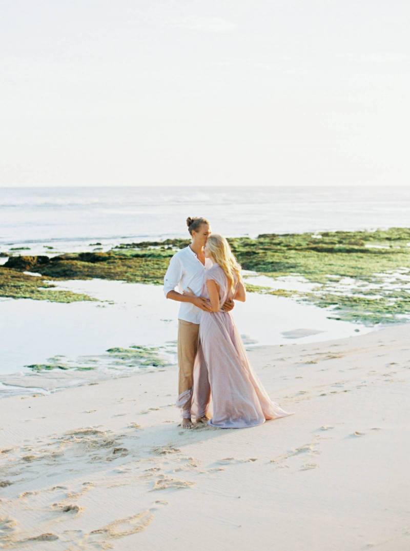 Engagement photos on the white sandy beaches of Bali