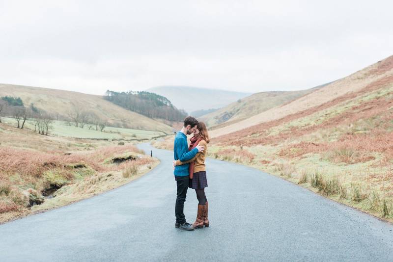 Couples shoot in the misty moorlands of Northern England