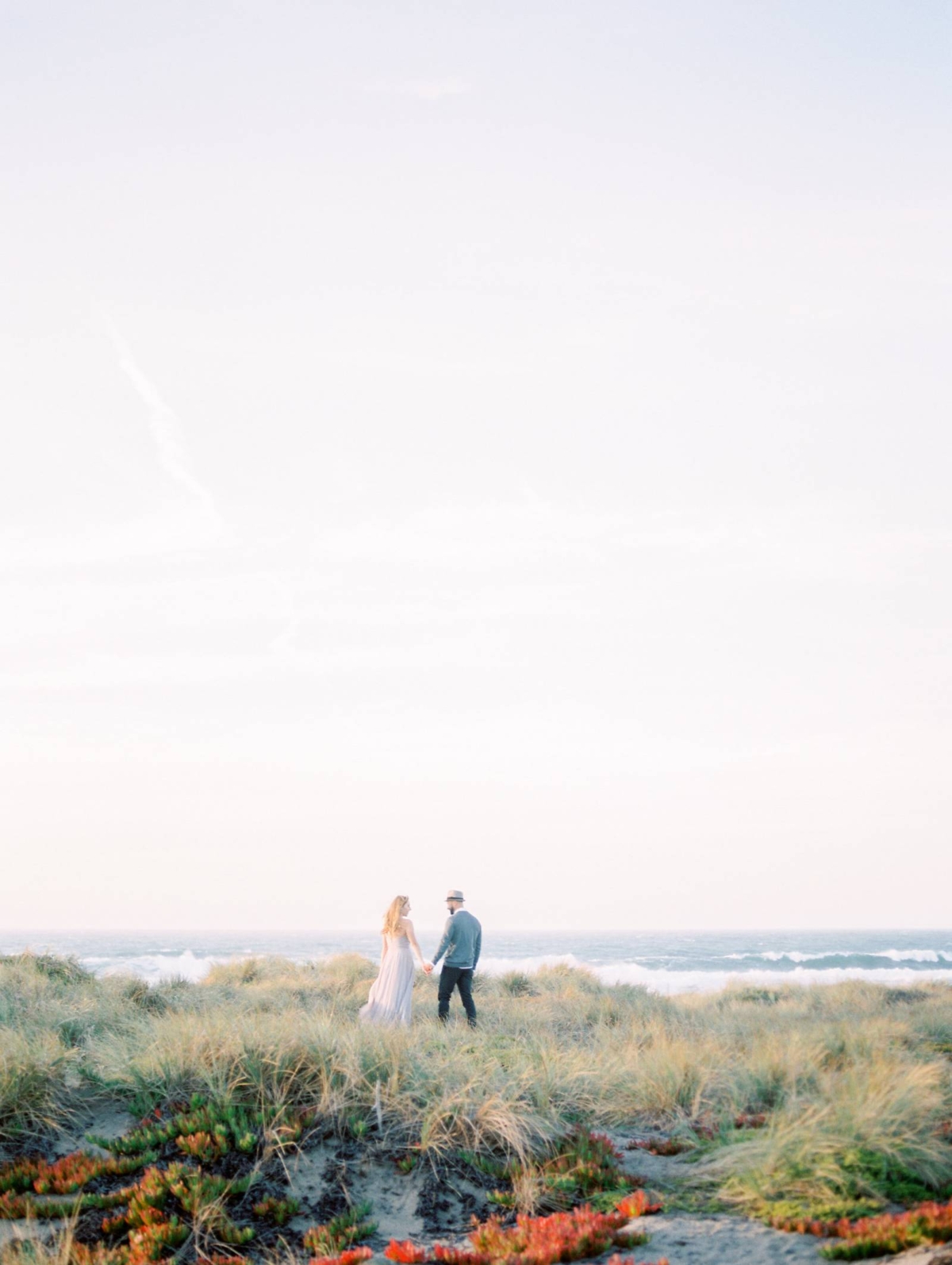 Rugged windswept engagement photos at Point Reyes