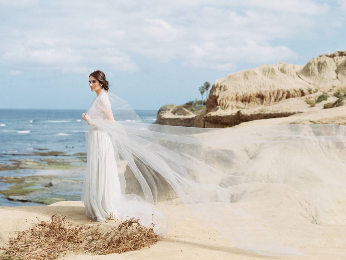 Plum & berry bridal inspiration against moody California skies