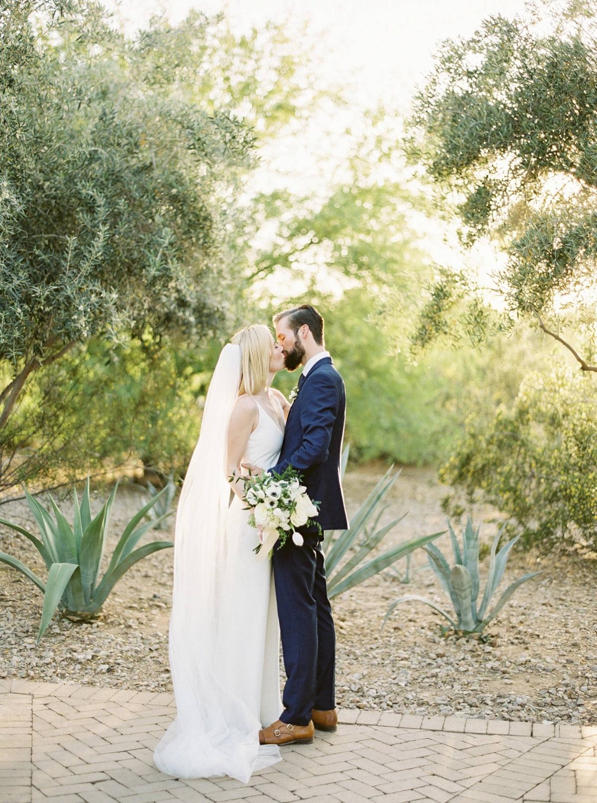 Elegant Arizona wedding with the bridal party all wearing white