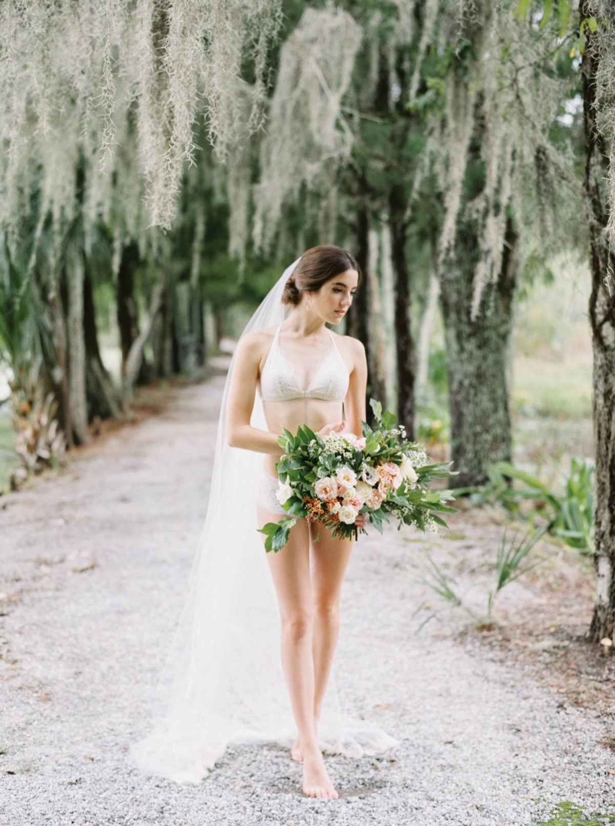 Organic early morning bridal shoot under hanging Spanish Moss