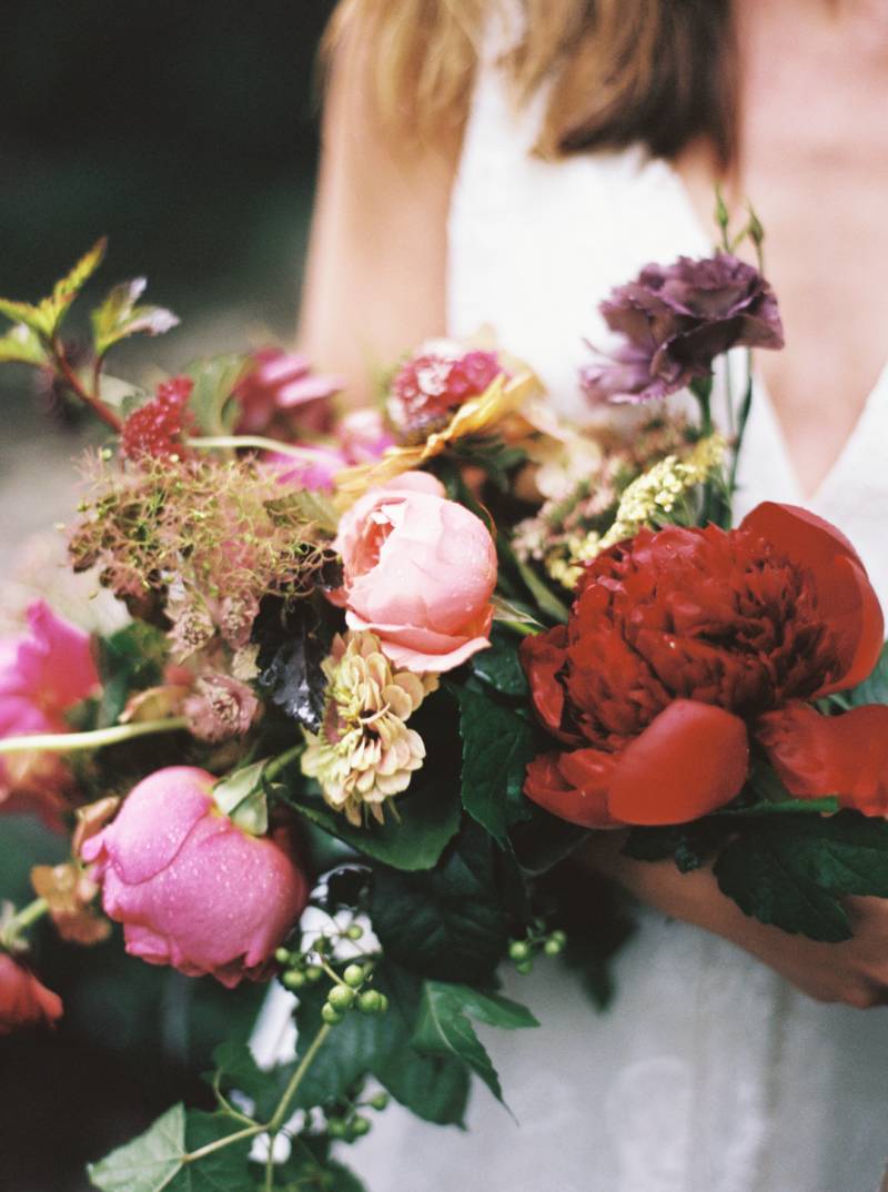 Moody garden wedding inspiration with vibrant florals