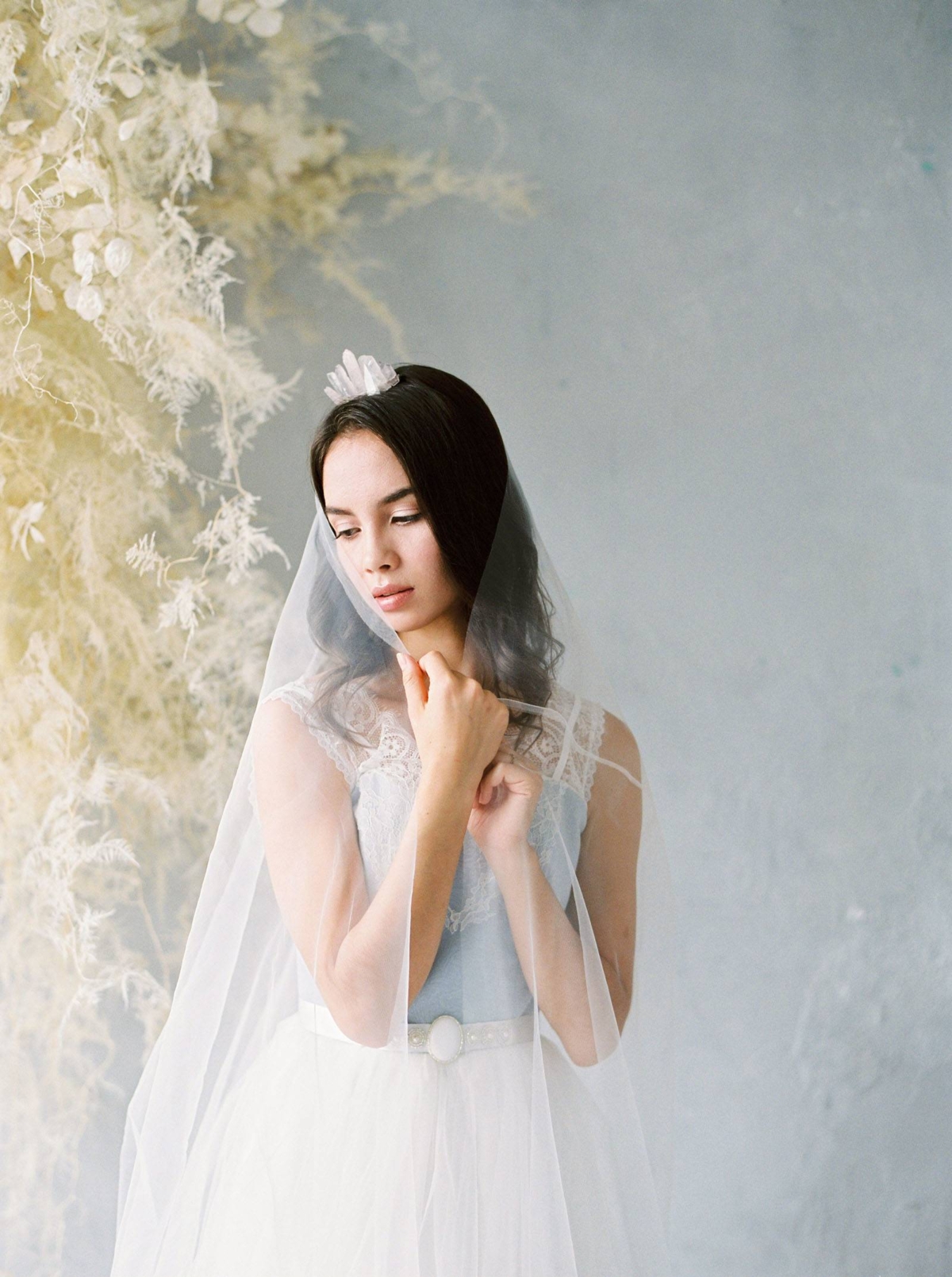 Ethereal winter bridal inspiration in smoky grey and blue tones