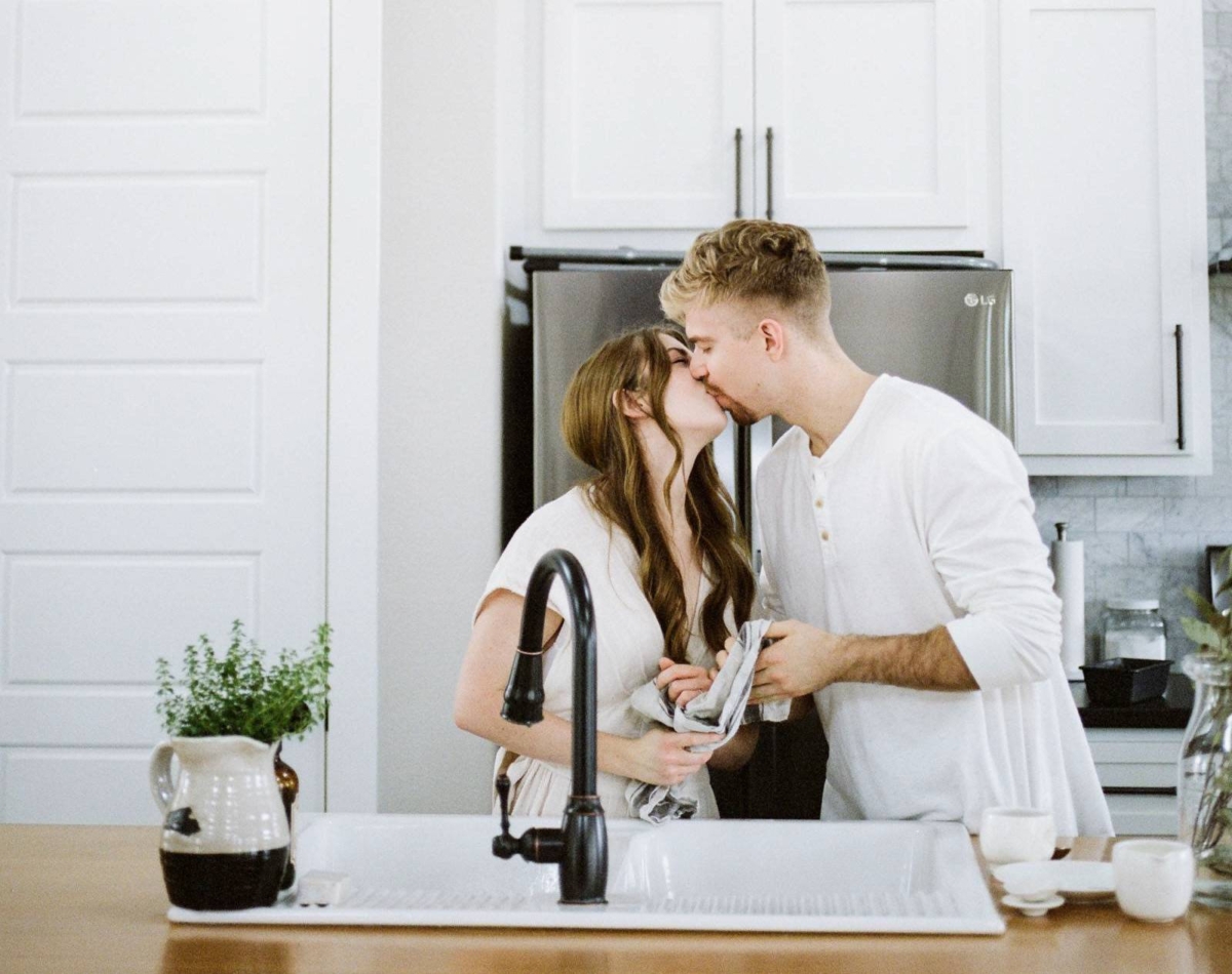 Engagement photos during an effortless morning at home with brunch