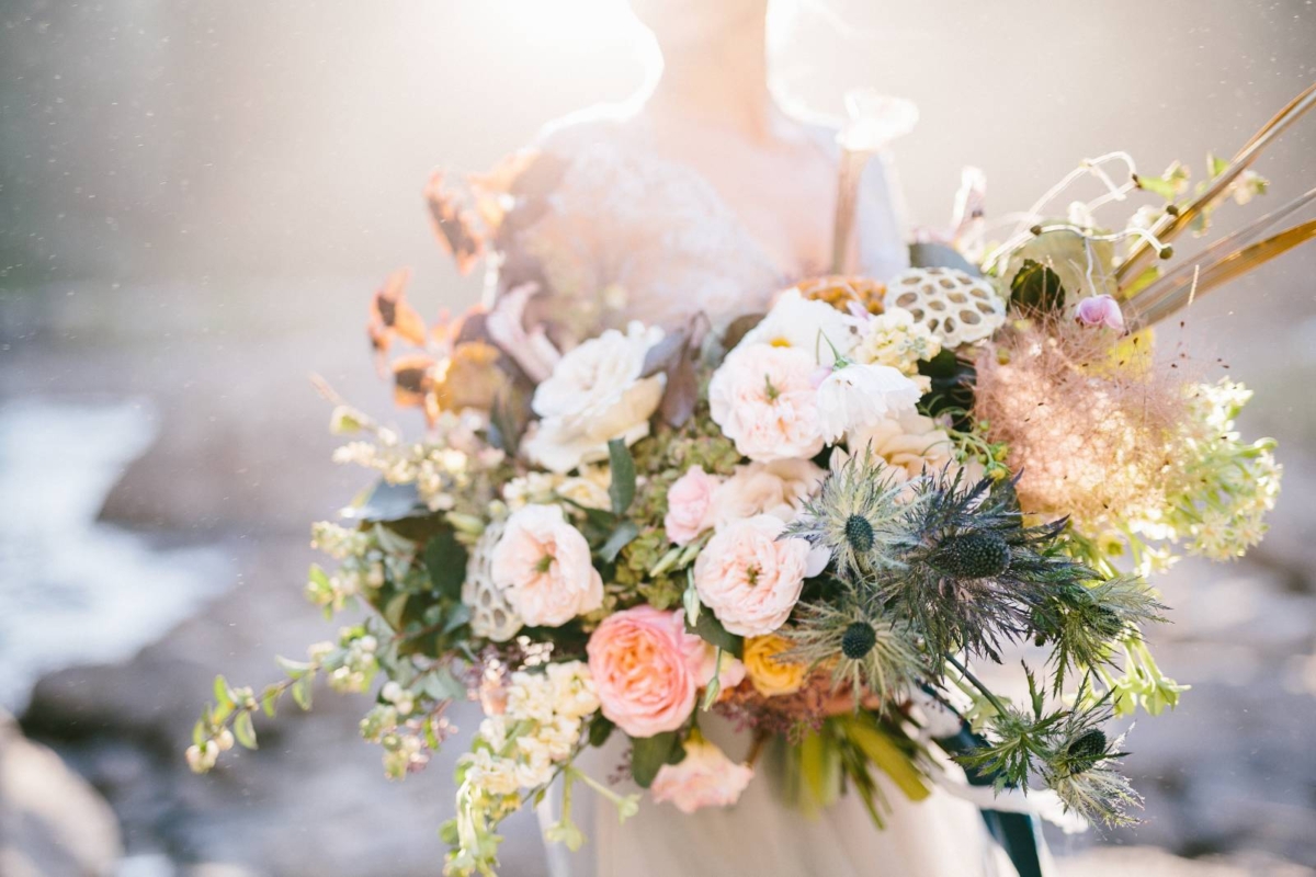 Winter bridal shoot at Snoqualmie Falls with stunning florals