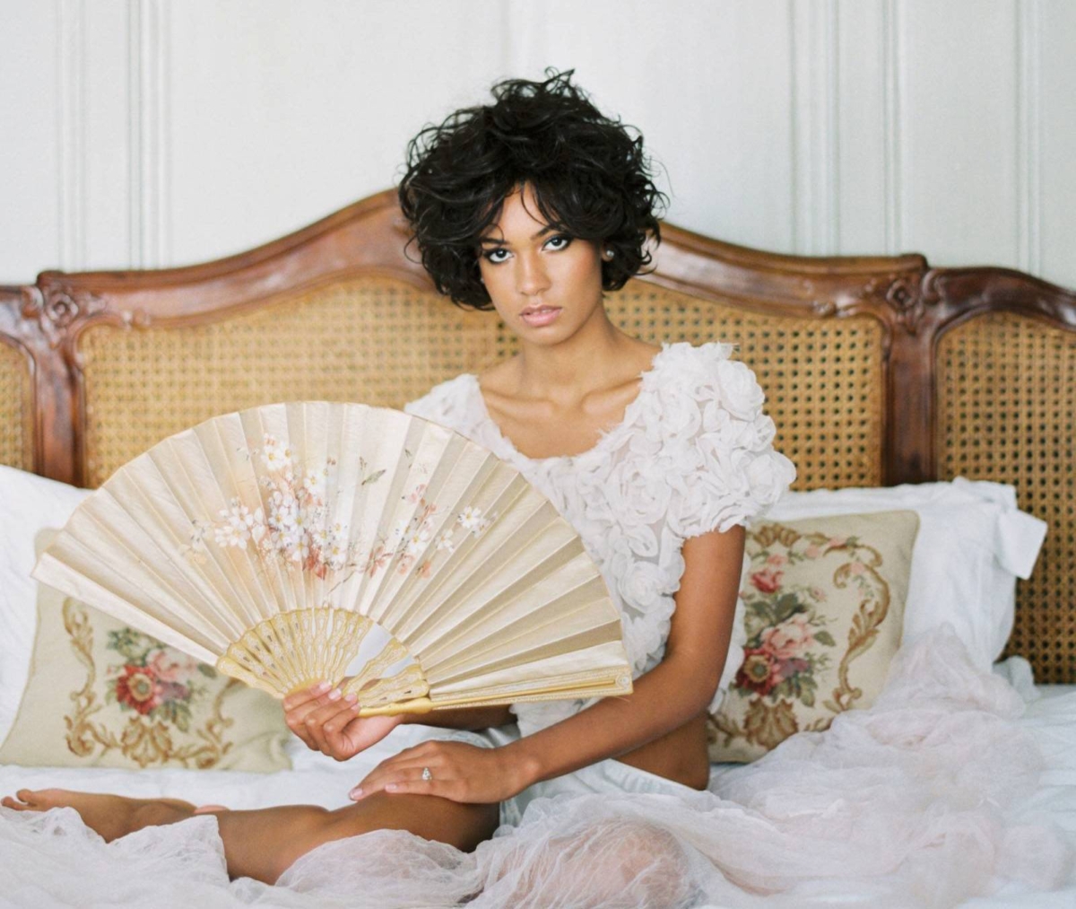 Playful couples boudoir session in a stunning Parisian apartment