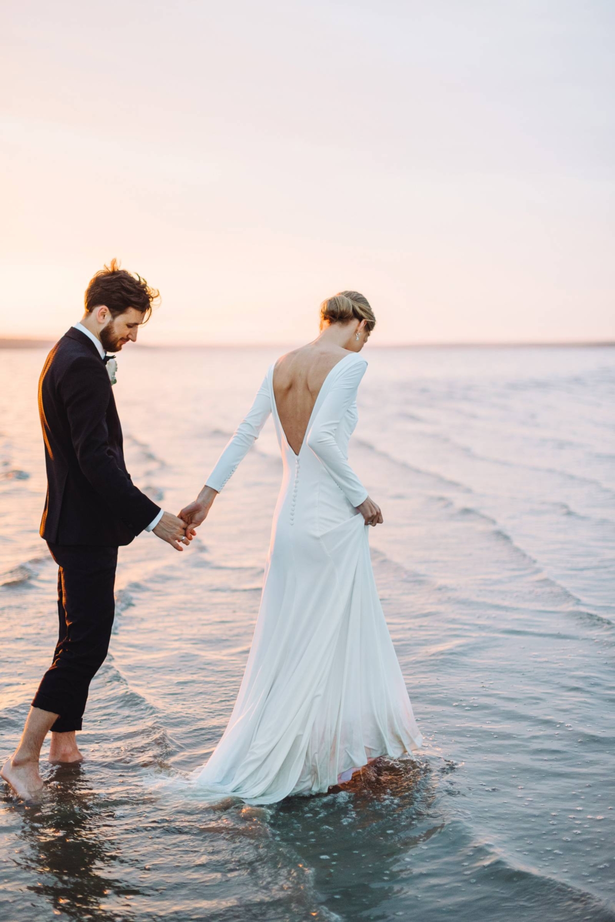 Minimalist post-wedding shoot surrounded by nature & water