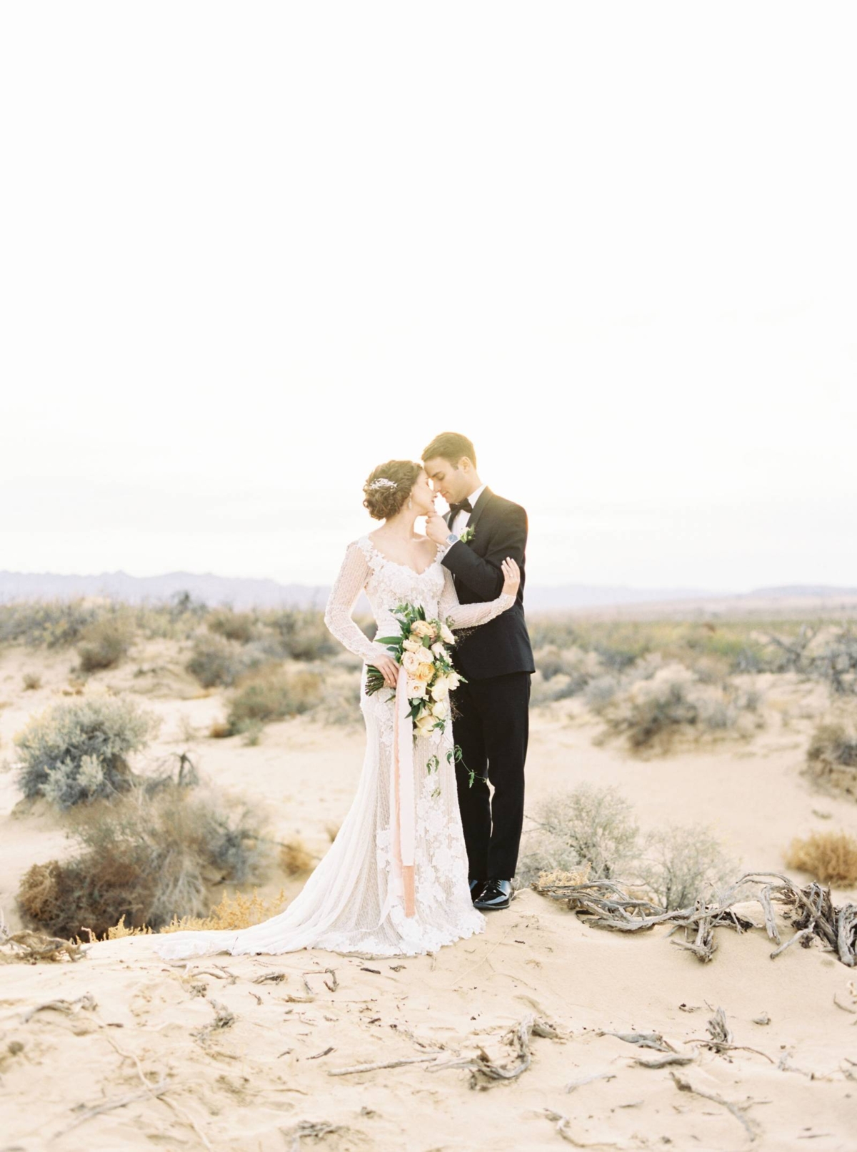 Desert wedding inspiration in warm orange and peach tones