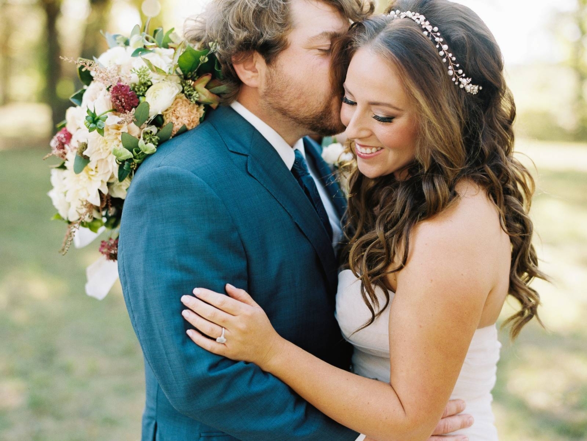 Gorgeous backyard wedding in Arkansas surrounded by fall foliage