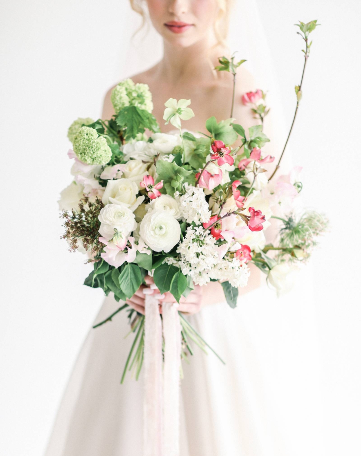 Spring wedding inspiration with dogwood blooms & a samoyed pup