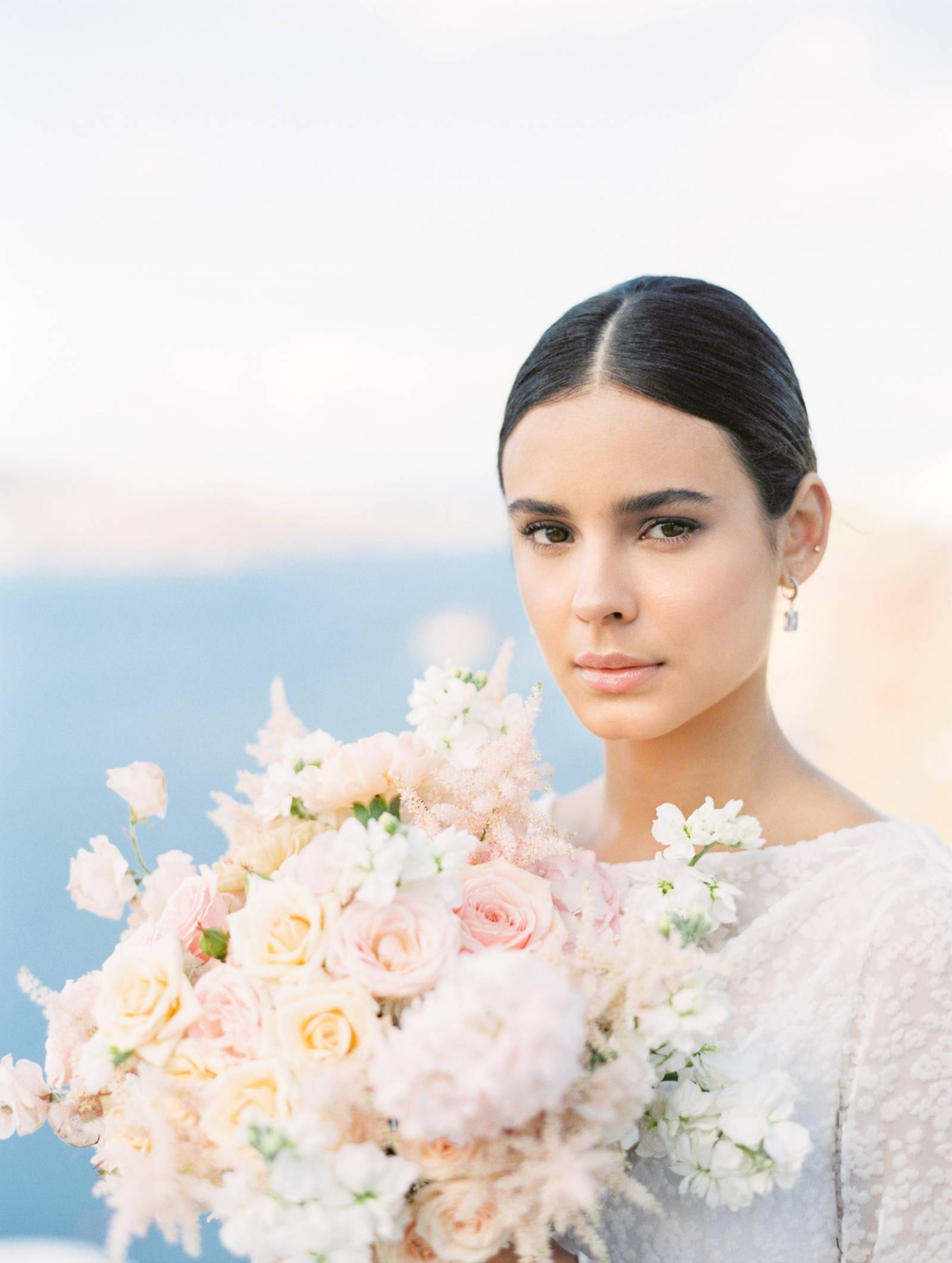 A modern curated elopement shoot on stunning Santorini