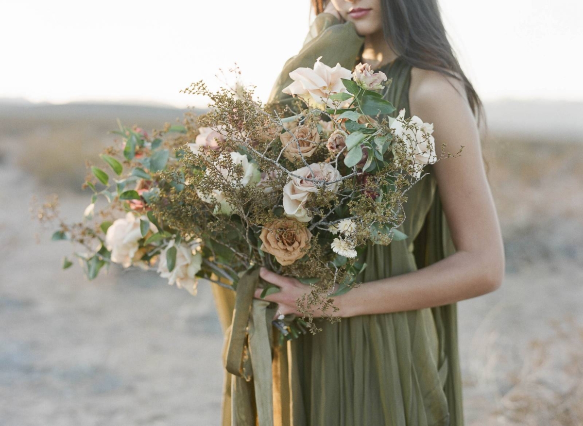 Desert wedding inspiration with a stunning green gown