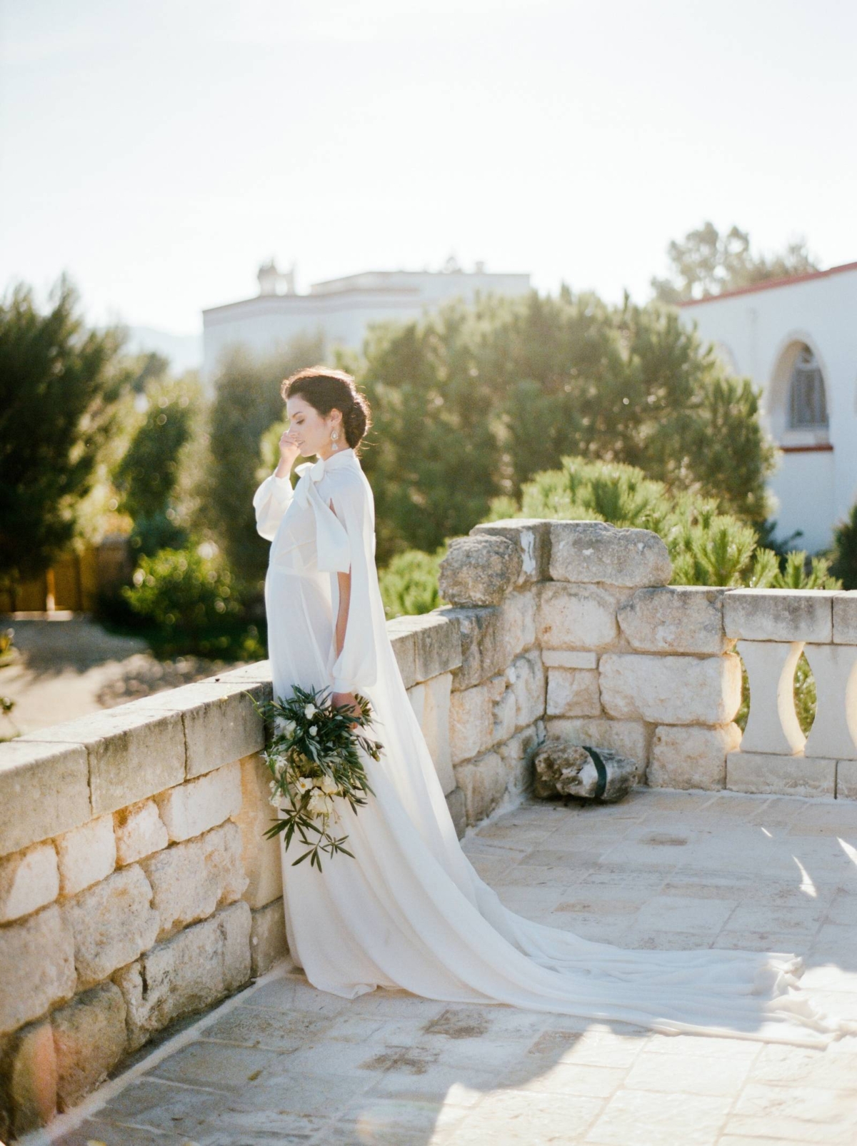 Wedding Inspiration amidst the azure waters and rolling green hills of Puglia