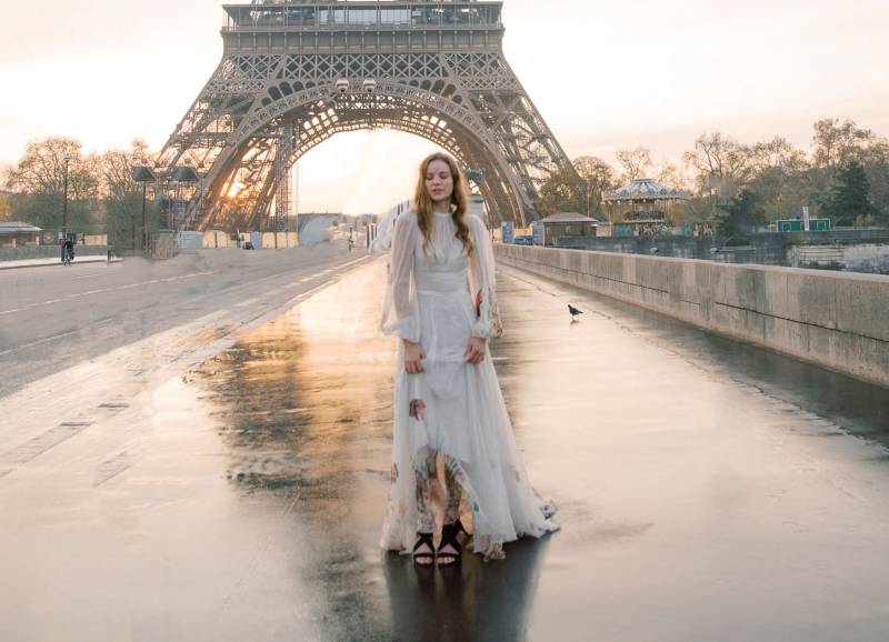 Romantic sunrise bridal session underneath the Eiffel Tower