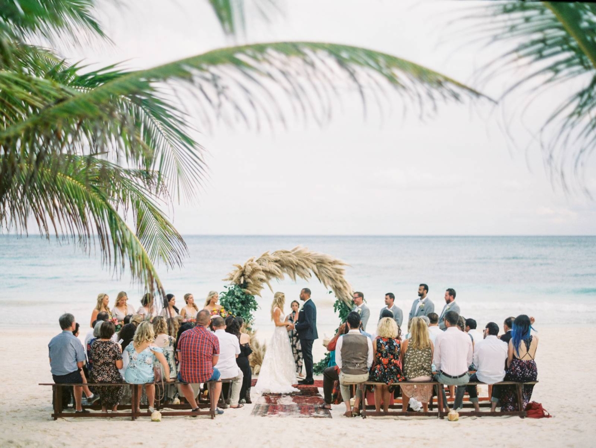 Fun & colourful beachside wedding in Tulum with a tropical boho vibe