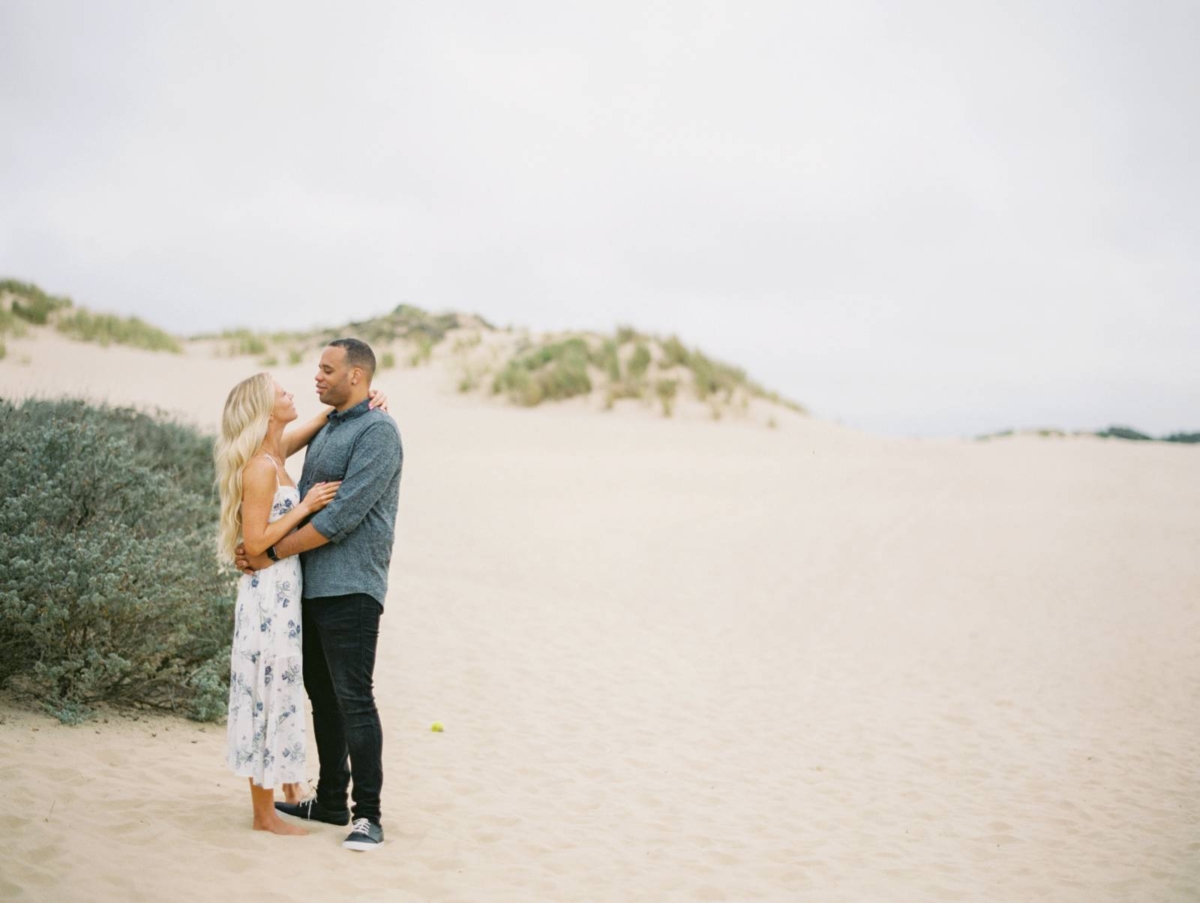 Engagement session amidst the sand dunes of Pismo Beach, California