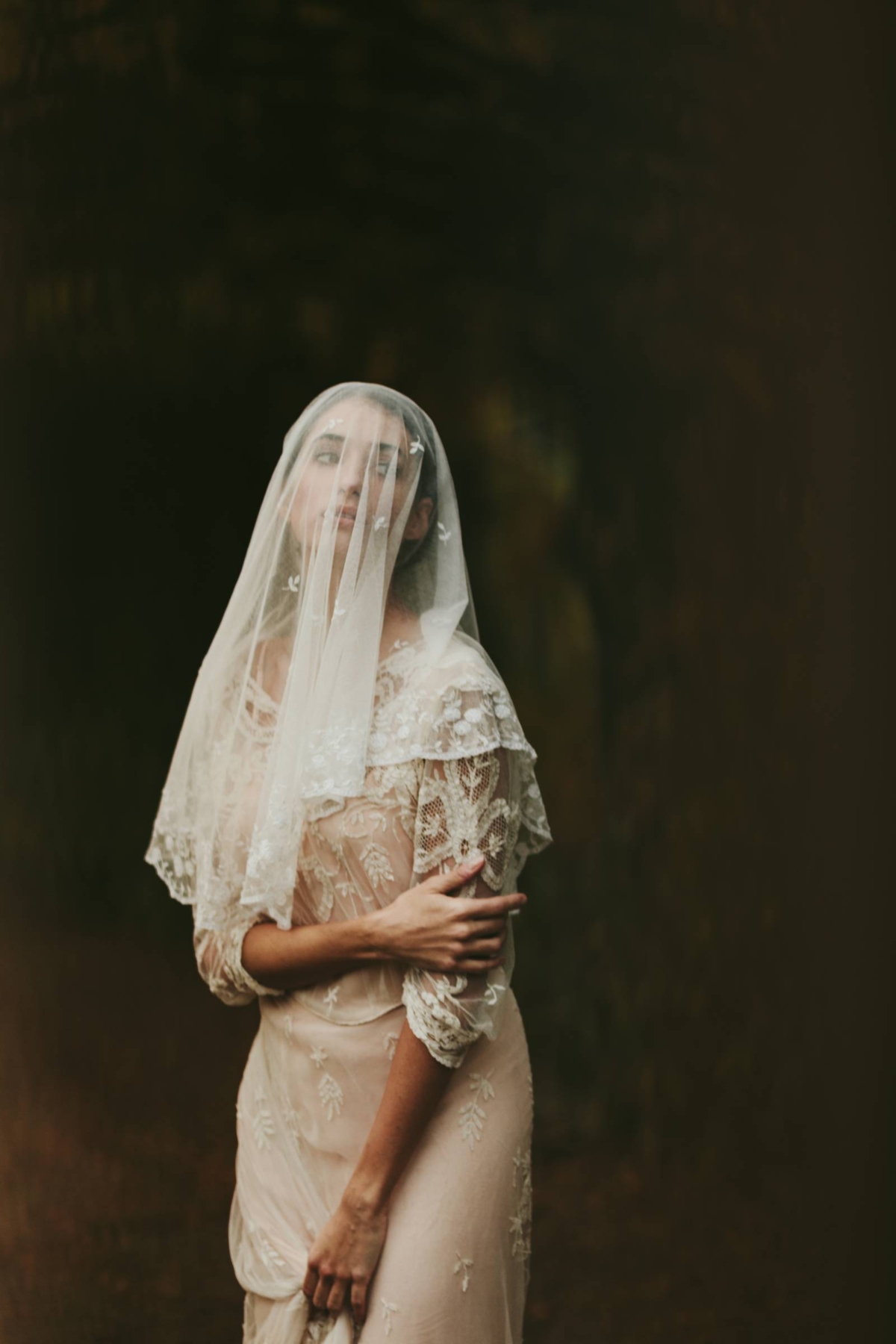 Bridal inspiration in the rainy streets of Florence featuring 100 year old vintage lace dresses