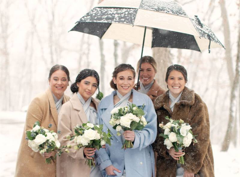 A romantic & elegant winter wedding full of candlelight and falling snow