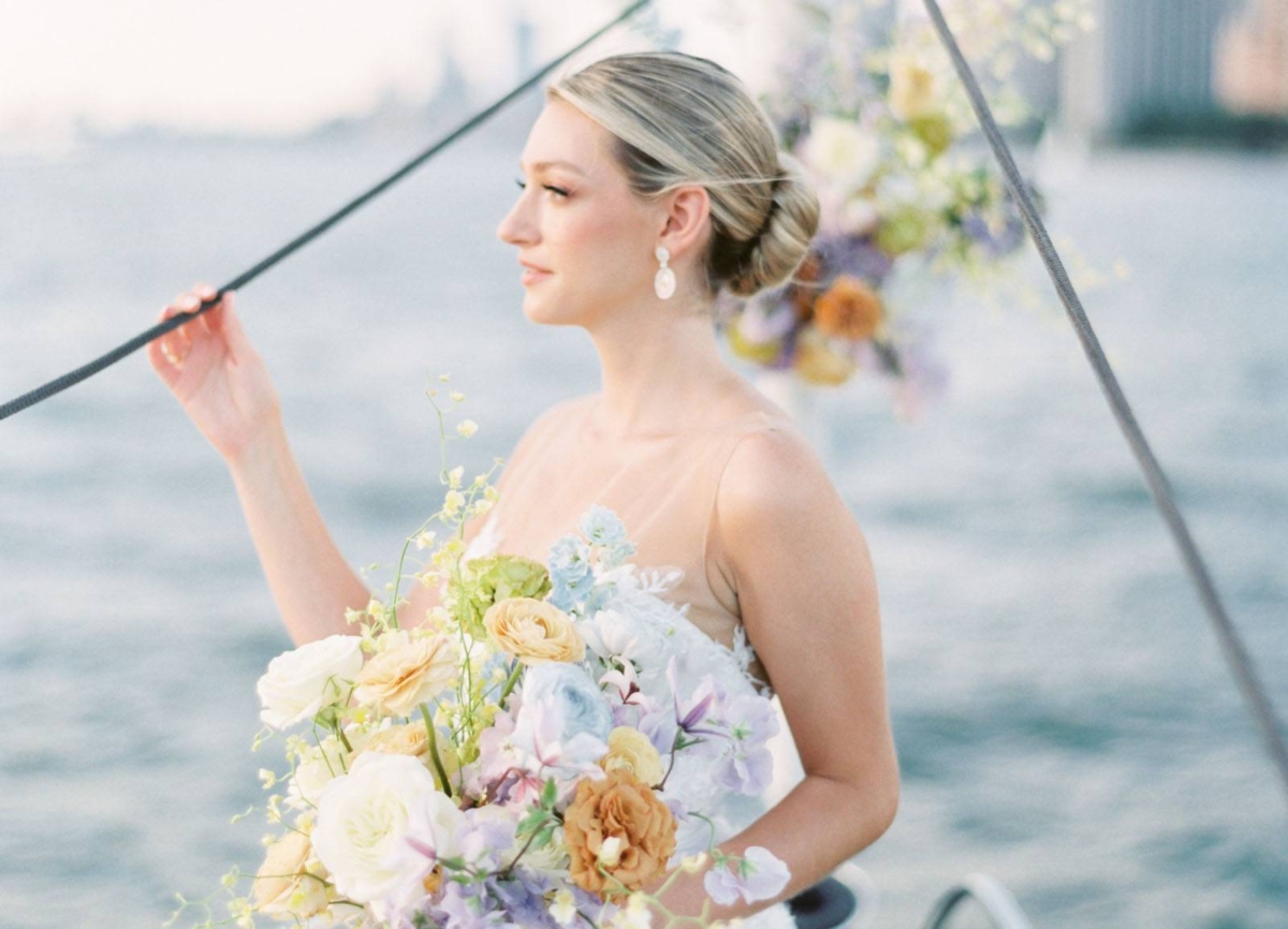 Romantic sailboat elopement shoot on the Hudson River at Sunset