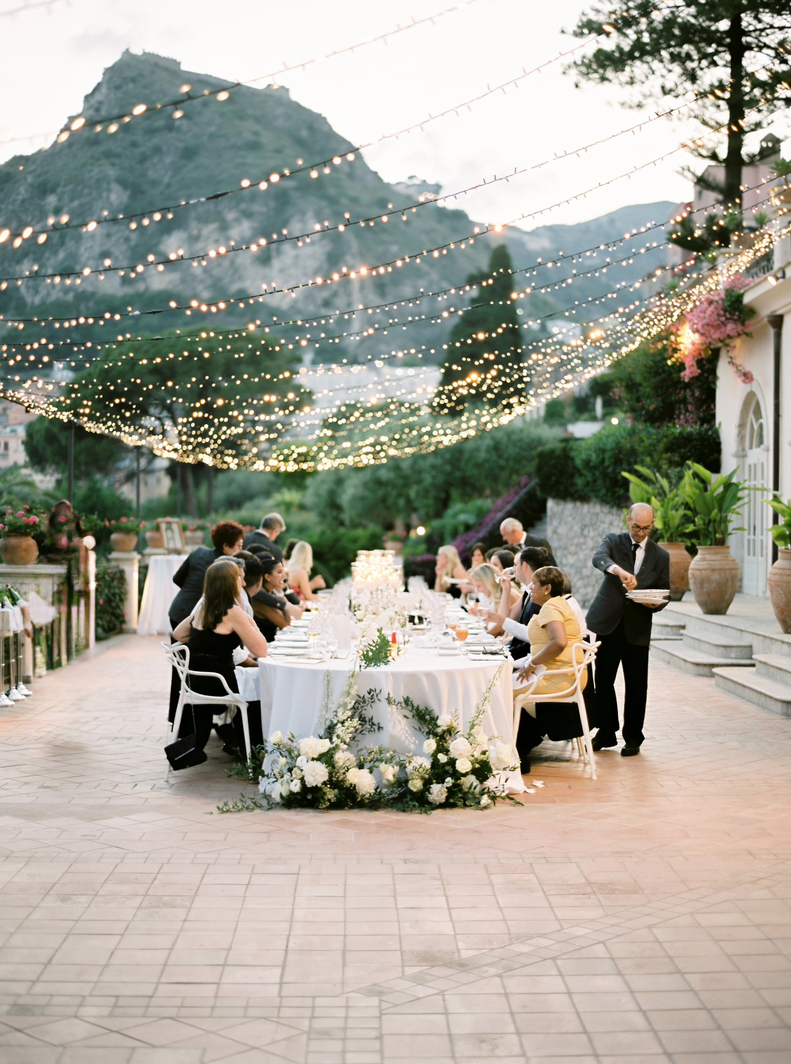 A destination micro-wedding with a pool party in Sicily