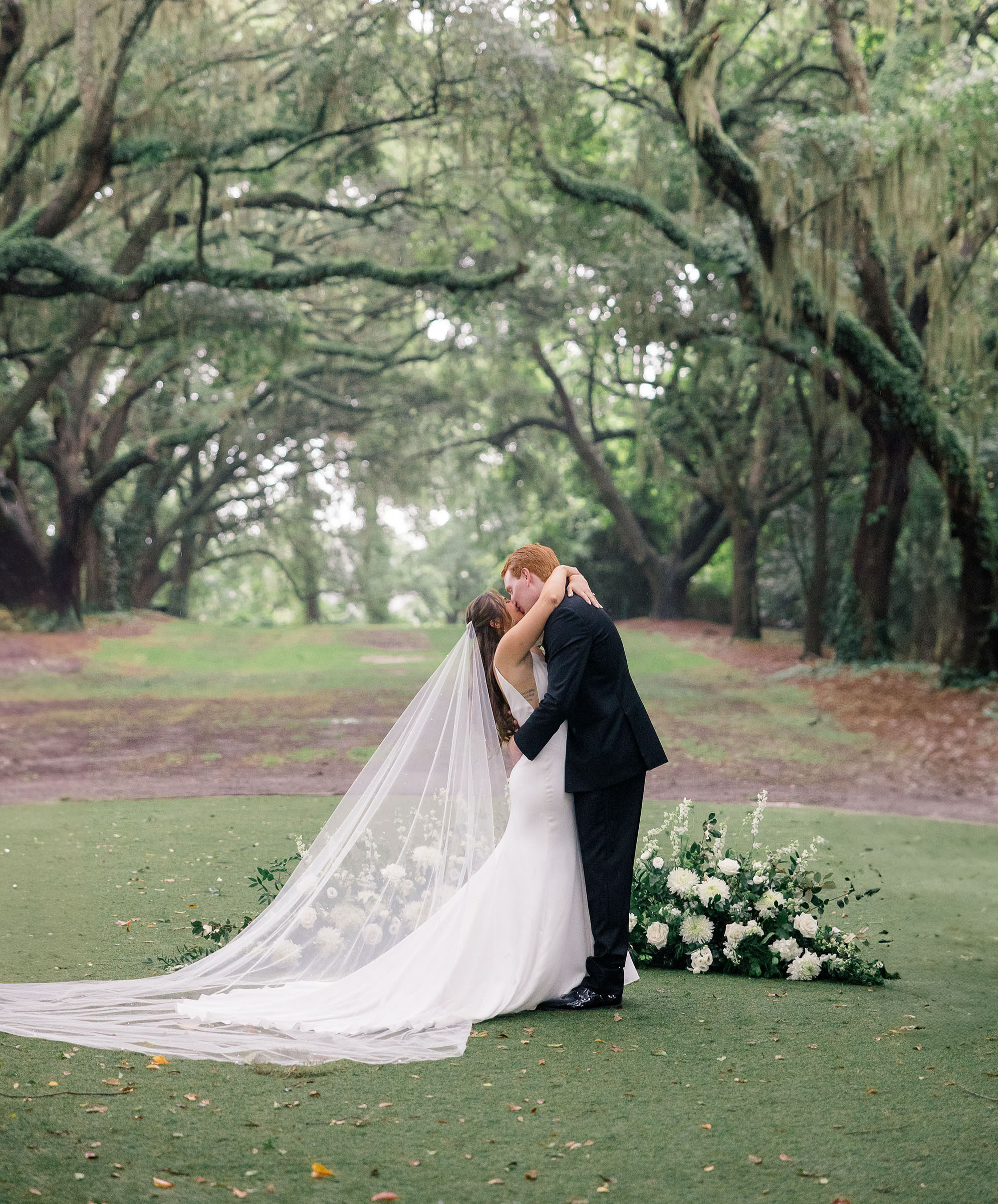 Rain-kissed romance Beneath Charleston’s Avenue of Oaks